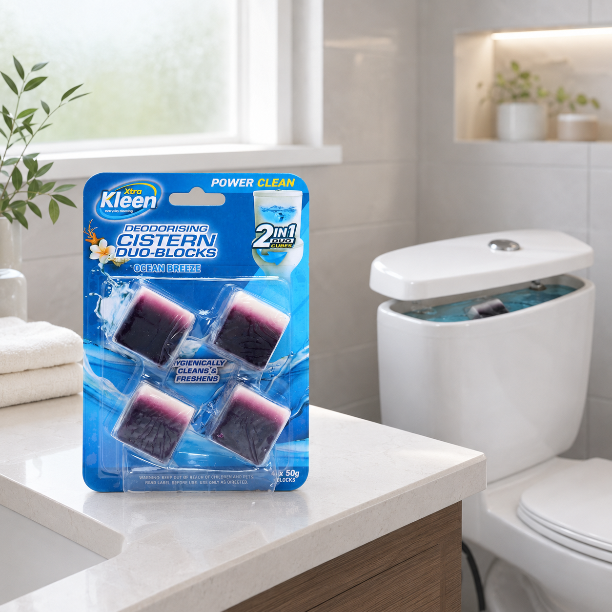 Xtra Kleen Cistern Duo-Cubes pack displayed on a modern white toilet cistern in a clean, bright bathroom